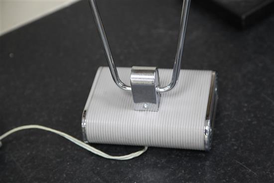 An Eileen Gray chromed metal and grey phenolic desk lamp, width 17.5in. height 15in.